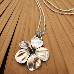 Handcrafted sterling silver hibiscus flower pendant with detailed petals